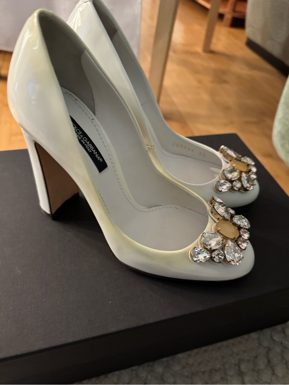 Dolce & Gabbana Ivory Patent Leather Pumps with Crystal Flower